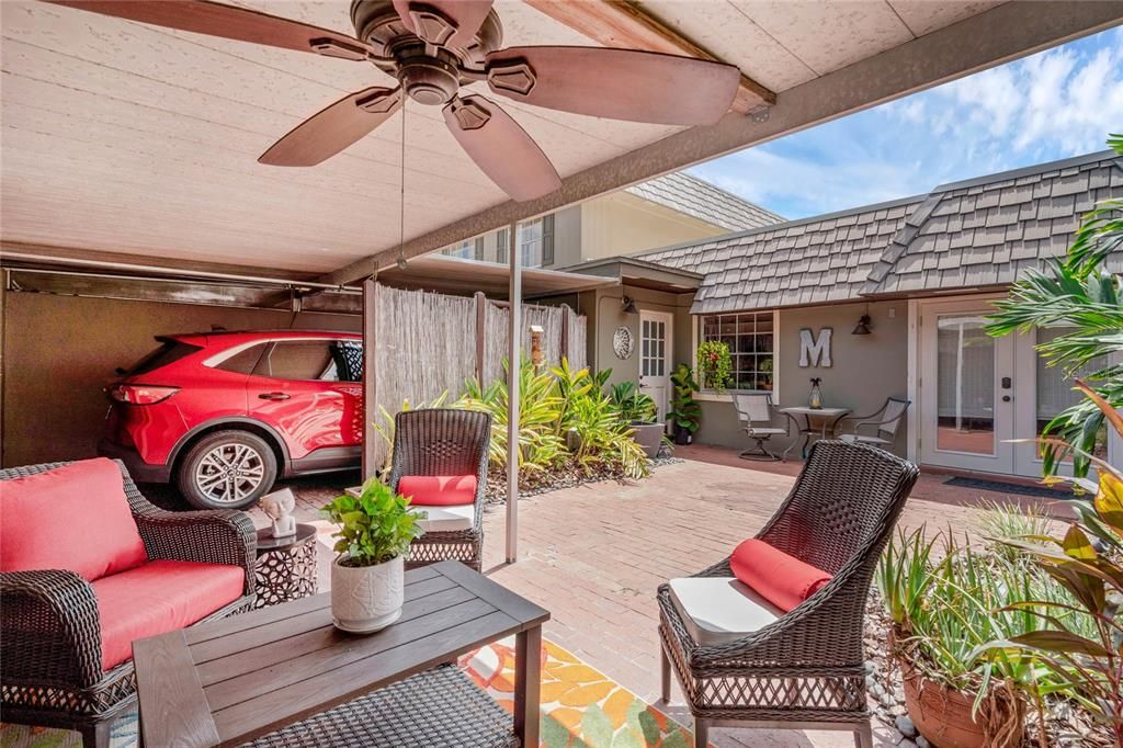 Courtyard/Carport w/ Garage Door