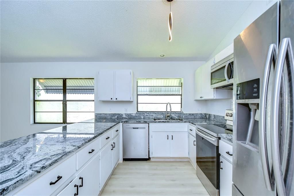 stainless appliance and NEW granite countertops!