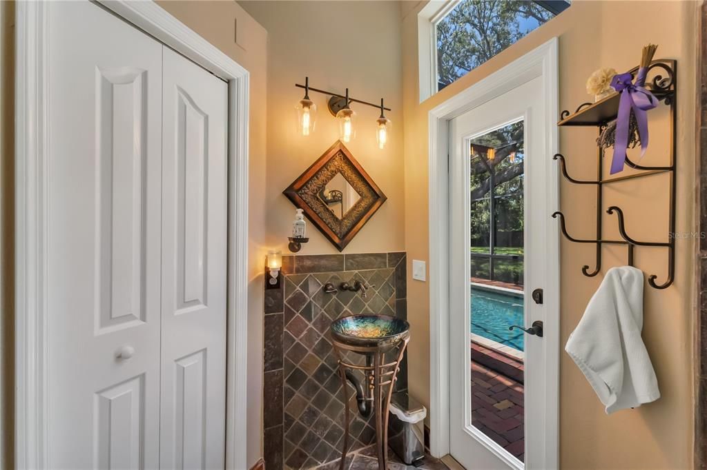 Full bath with steam shower and direct access to pool