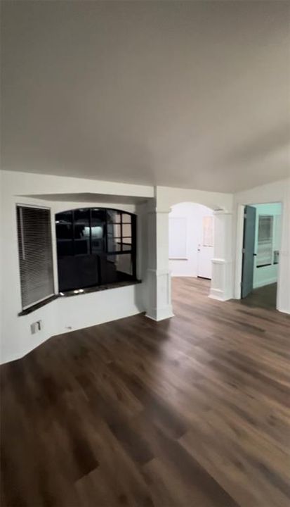 Living room, foyer and master bedroom.