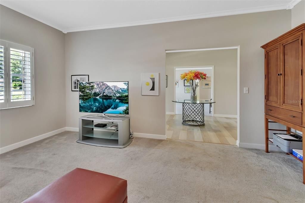 FORMAL DINING ROOM USED AS TV/DEN