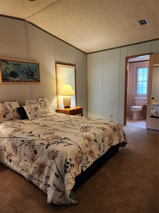 Primary Bedroom showing location of ensuite bathroom