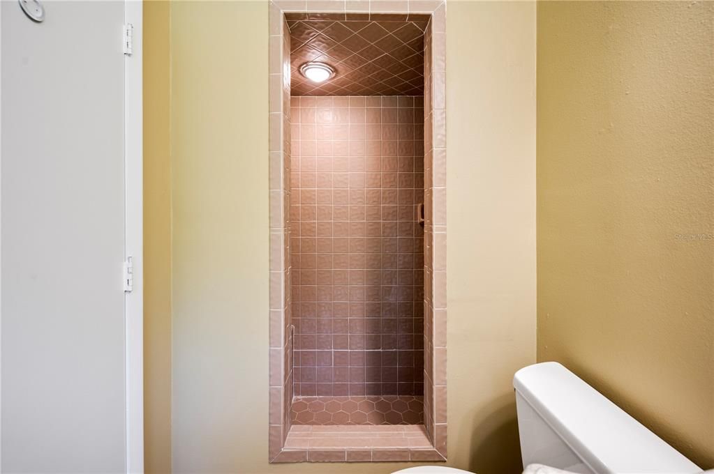 Shower with bench in bedroom 2