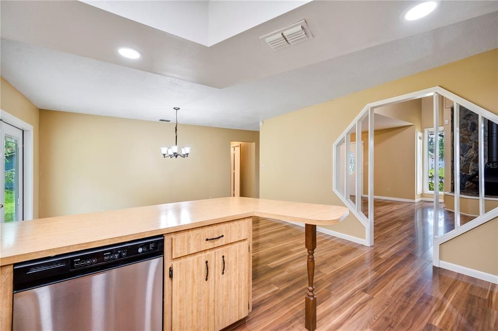 different view from kitchen to dining room and living room