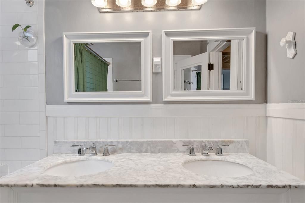 Bathroom with Granite Counter Tops Dual Sinks.