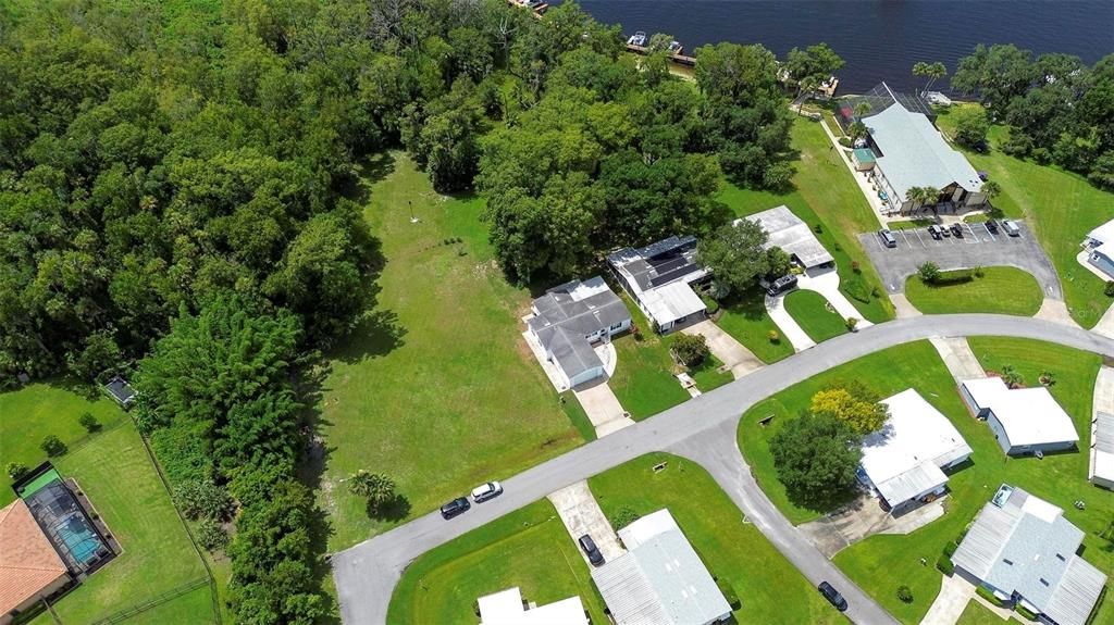 Aerial view showing St Johns River in rear of home.