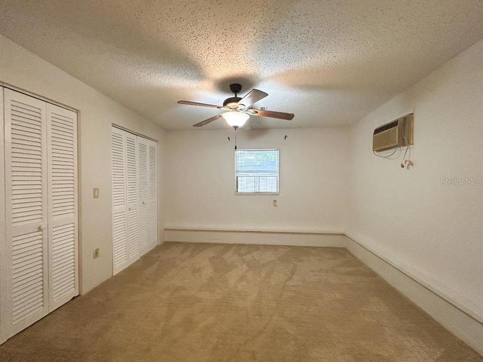 Sitting Room with 2 double closets in primary