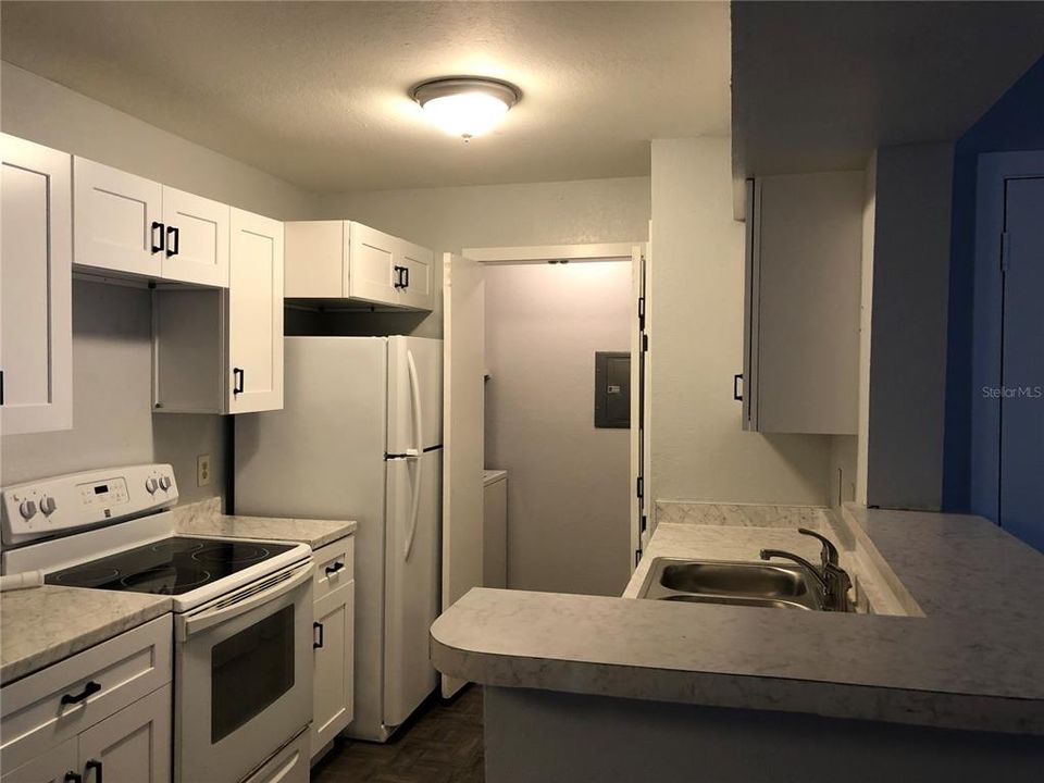 Kitchen with laundry room