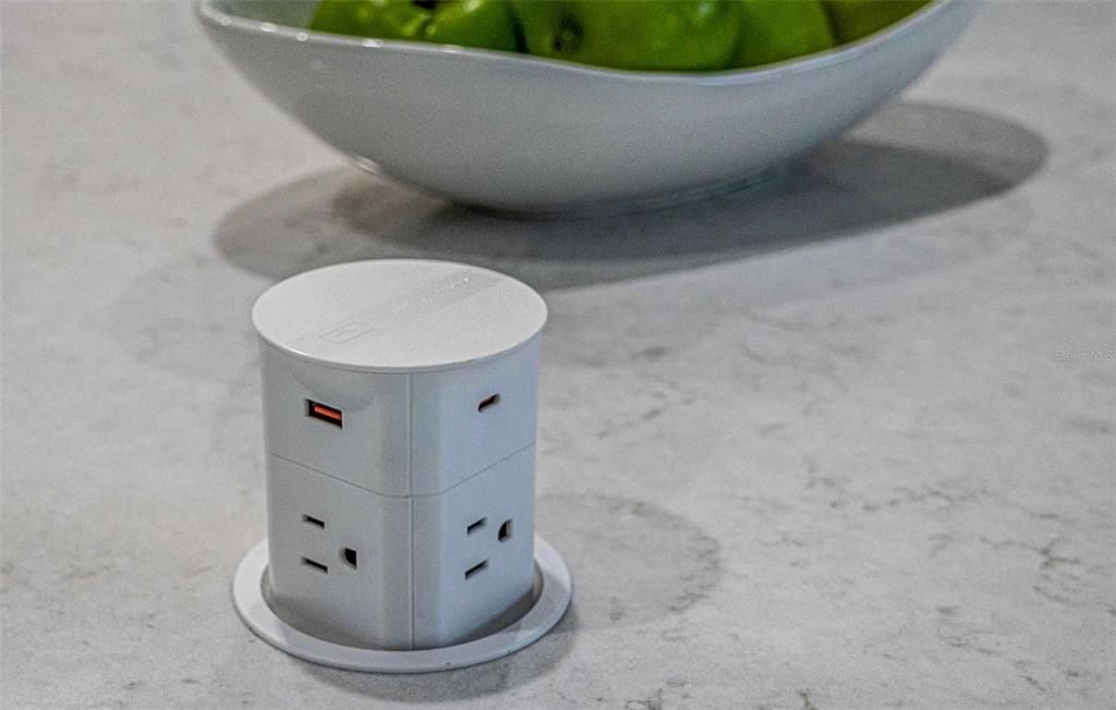 Pop up power outlet/phone charger in kitchen