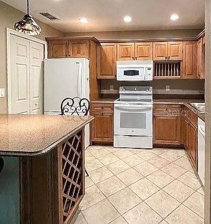 Kitchen with white appliances