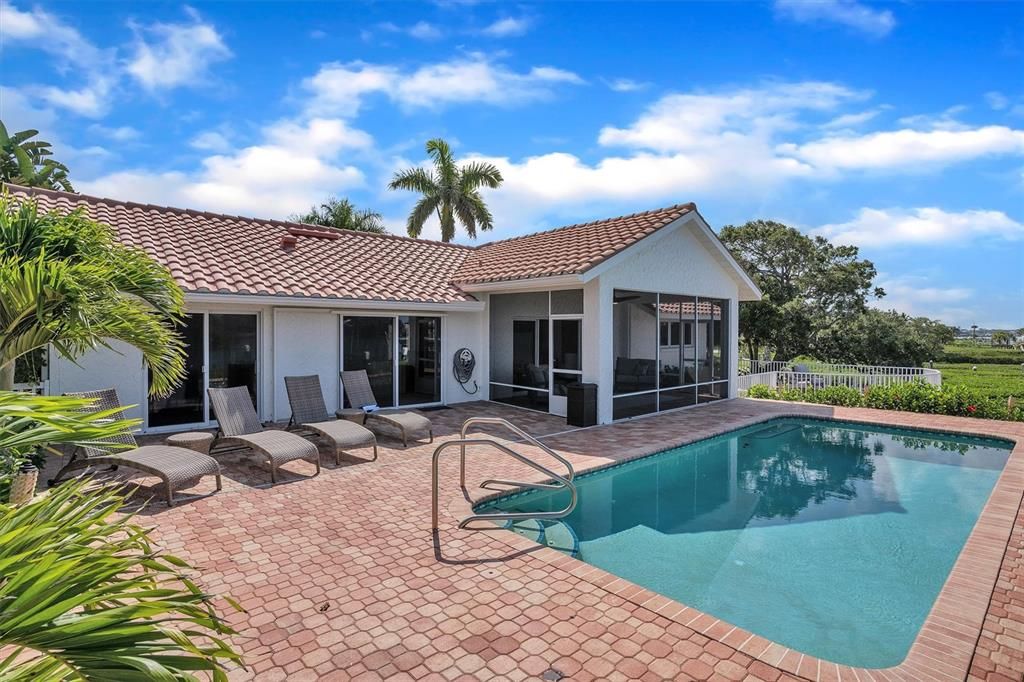 Patio and pool overlooking the bay