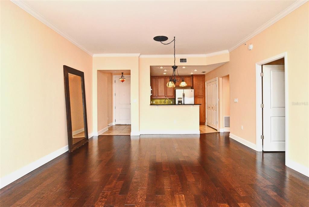 Dining Area with Kitchen in Background Pic 1