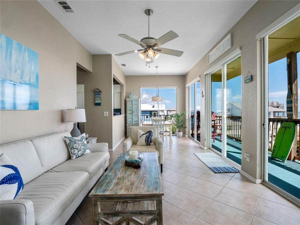 10-foot ceilings and sun-drenched sliders that lead to your large private balcony, immersing you in a tropical paradise to enjoy gorgeous views and beautiful sunrises.