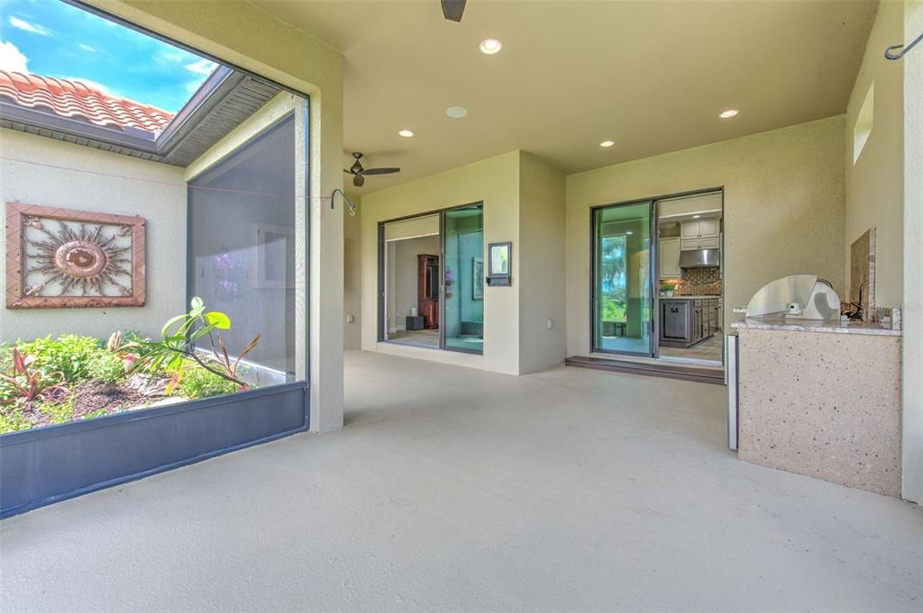 Covered & screened in Lanai overlooking the water!