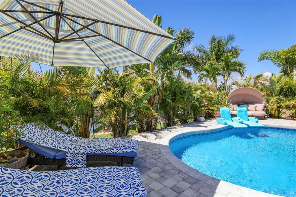 The pool deck is large enough to support multiple areas to relax, nap or just lounge near the pool.