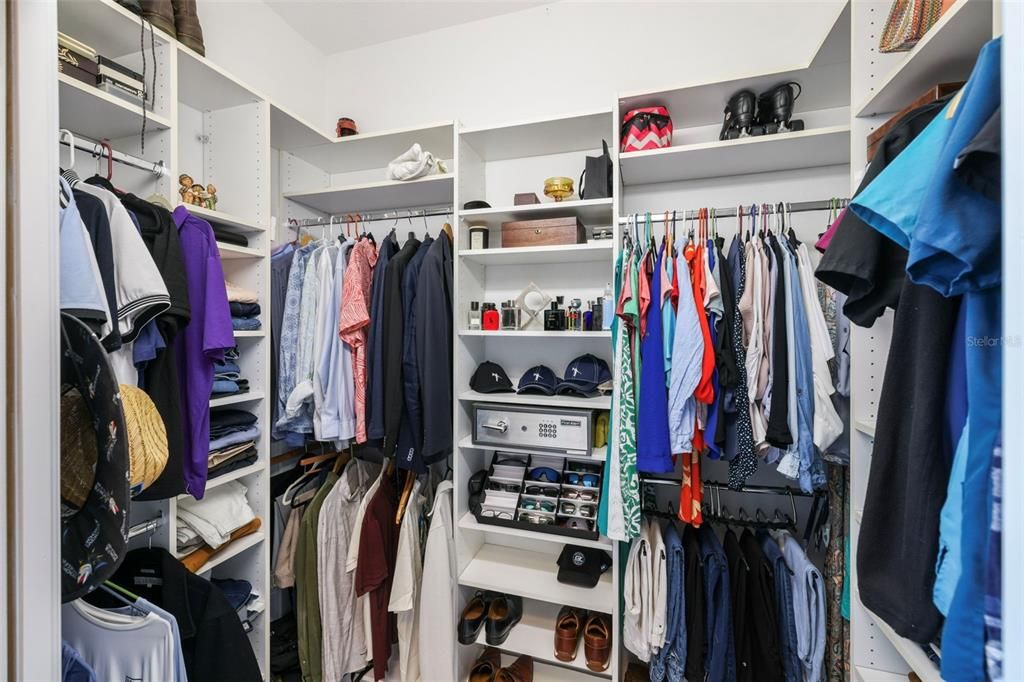 Large custom walk-in closet.