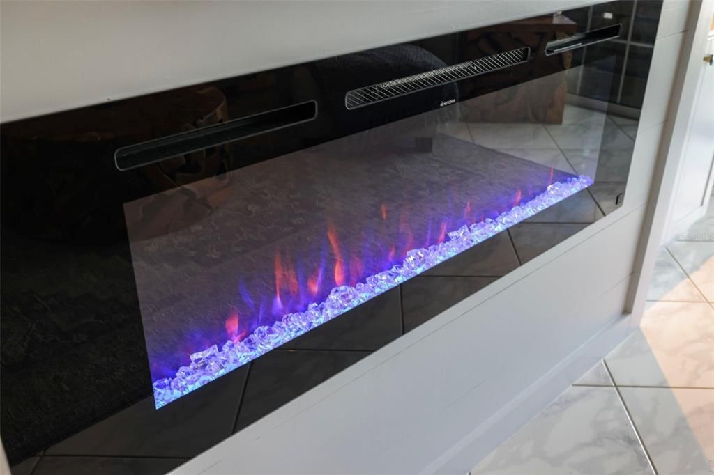 The electric fireplace brings a mood of relaxed ambience and can be used with or with heat.