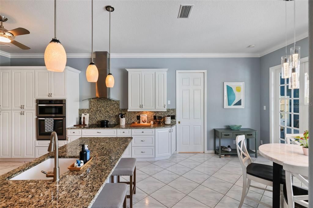 Clean and functional kitchen with quality cabinetry and counters.