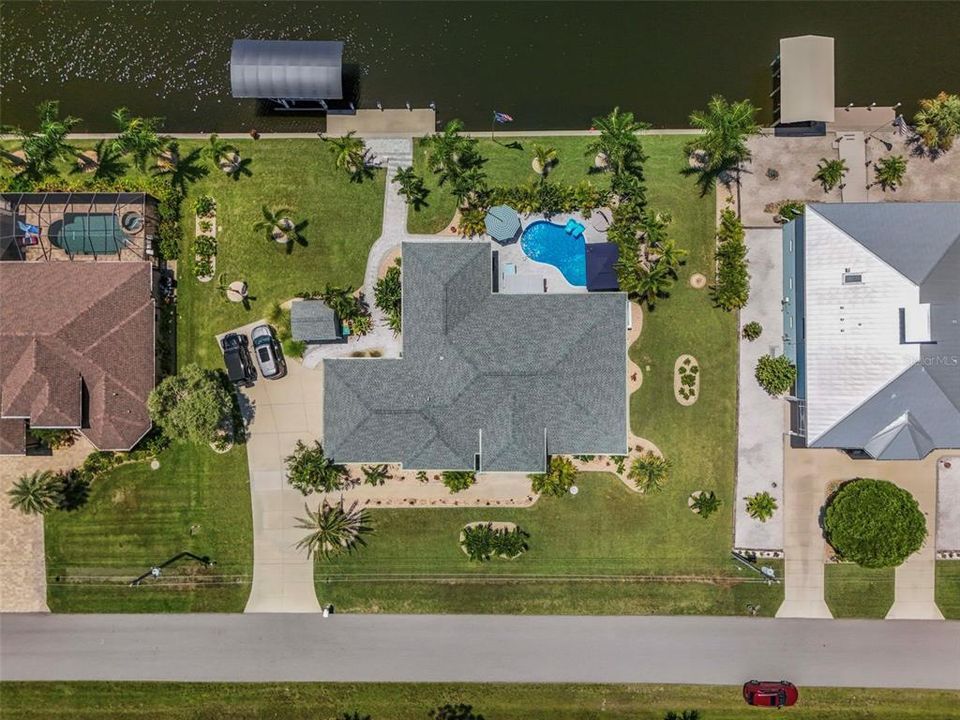 Aerial view of the expansive lot. Welcome home to 15794 Viscount Cir.