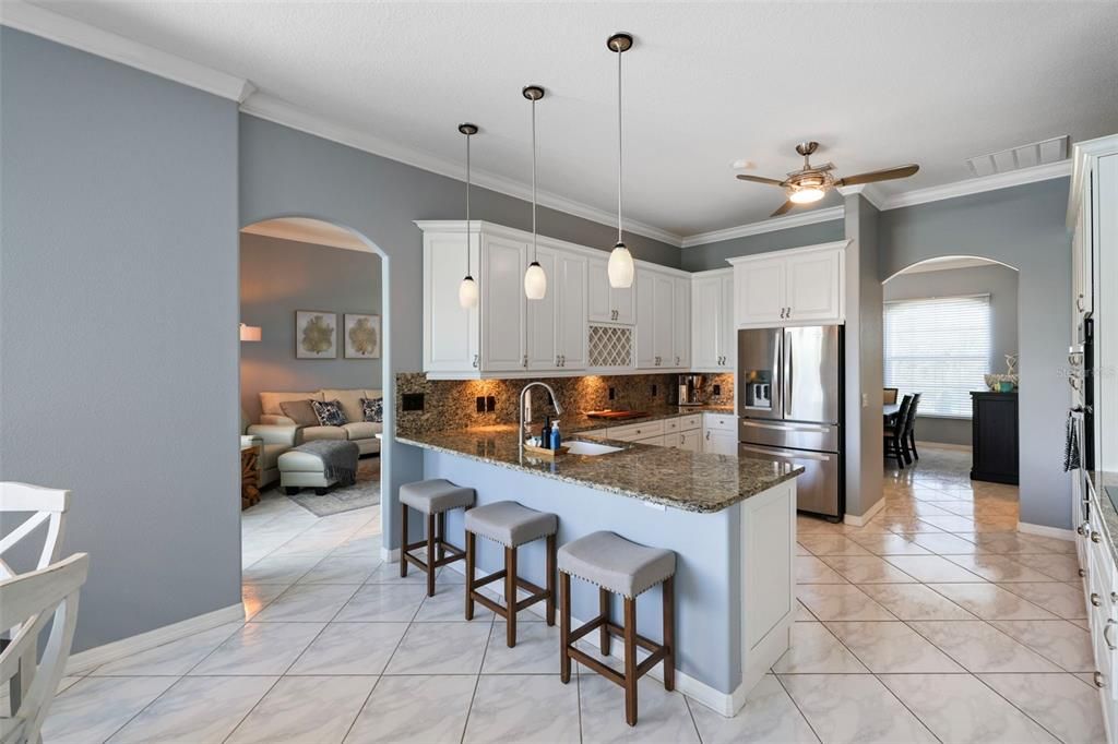 Spacious, open kitchen centrally located, perfect for cooking and entertaining guests.