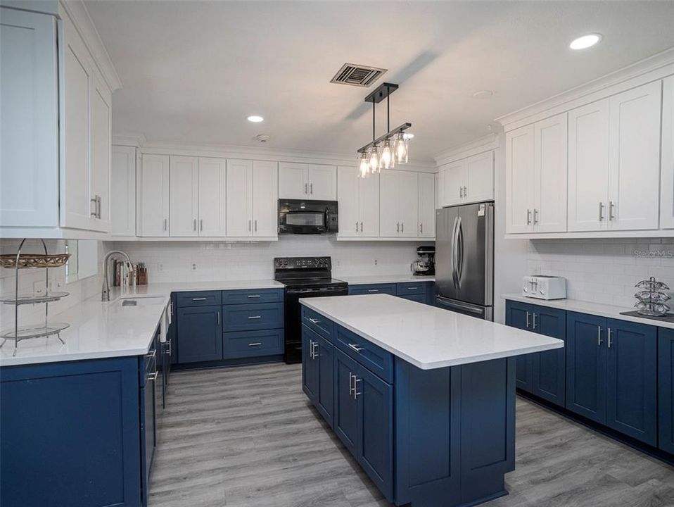 Quartz CounterTop, Kitchen Island with storage and Soft Close Cabinets