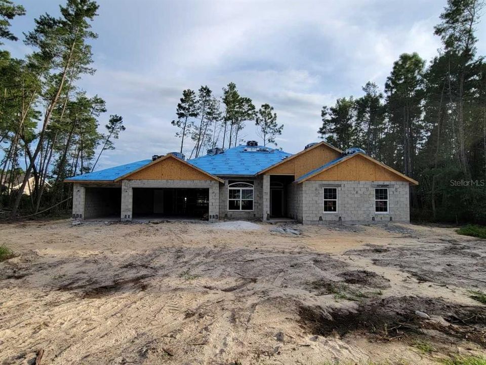 Actual home under construction!  3 car garage!