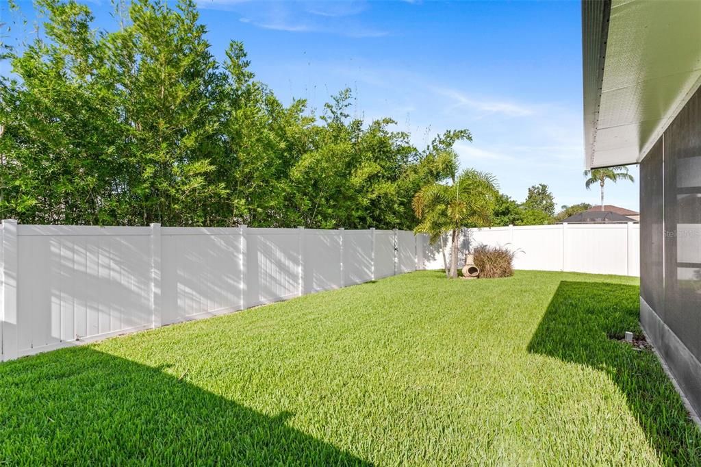 Rear Yard Featuring 6 ft Privacy Vinyl Fence