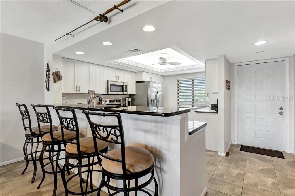 Kitchen with bar stools