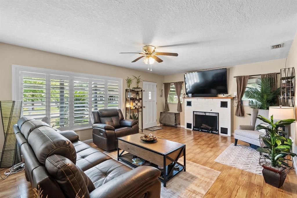 Wood-Burning Fireplace and tile flooring throughout home.