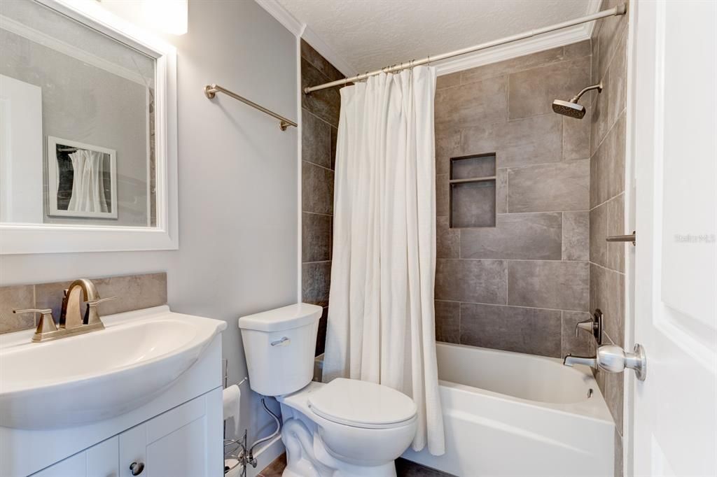 Guest Bathroom with Tub and Shower