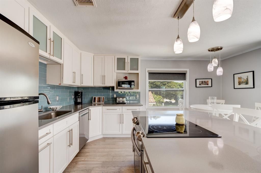 Quartz Countertops and Glass Block Backsplash