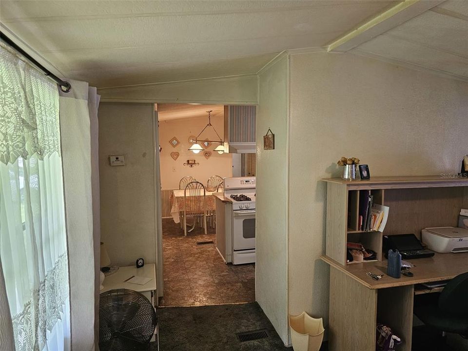 Looking towards kitchen and dining room from front door