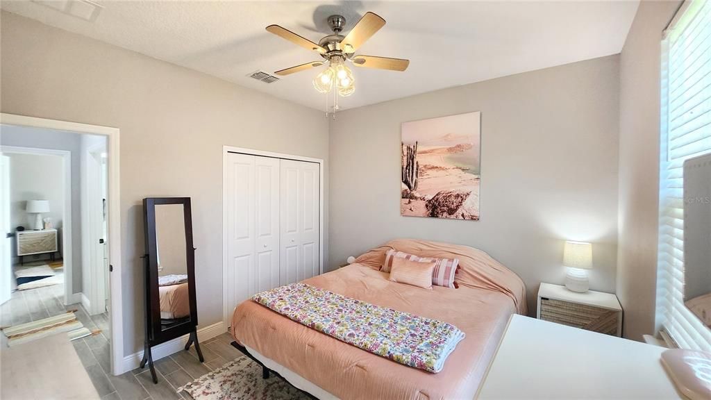 Bedroom 2 has modern ceiling fan