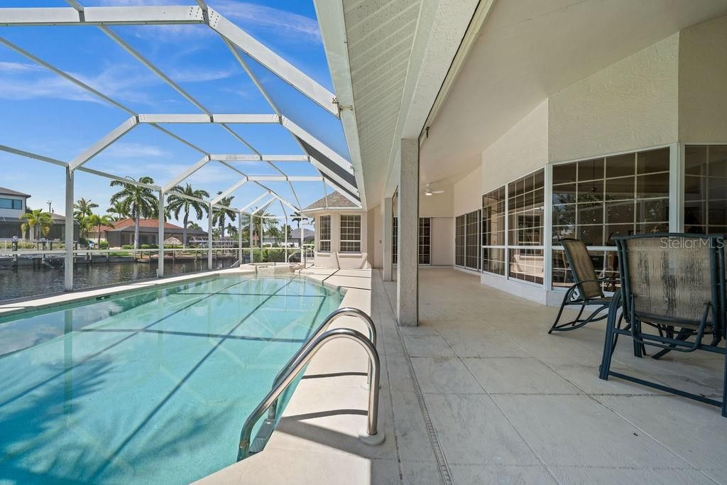 Large Pool and Lanai with roll down Hurricane Shutters