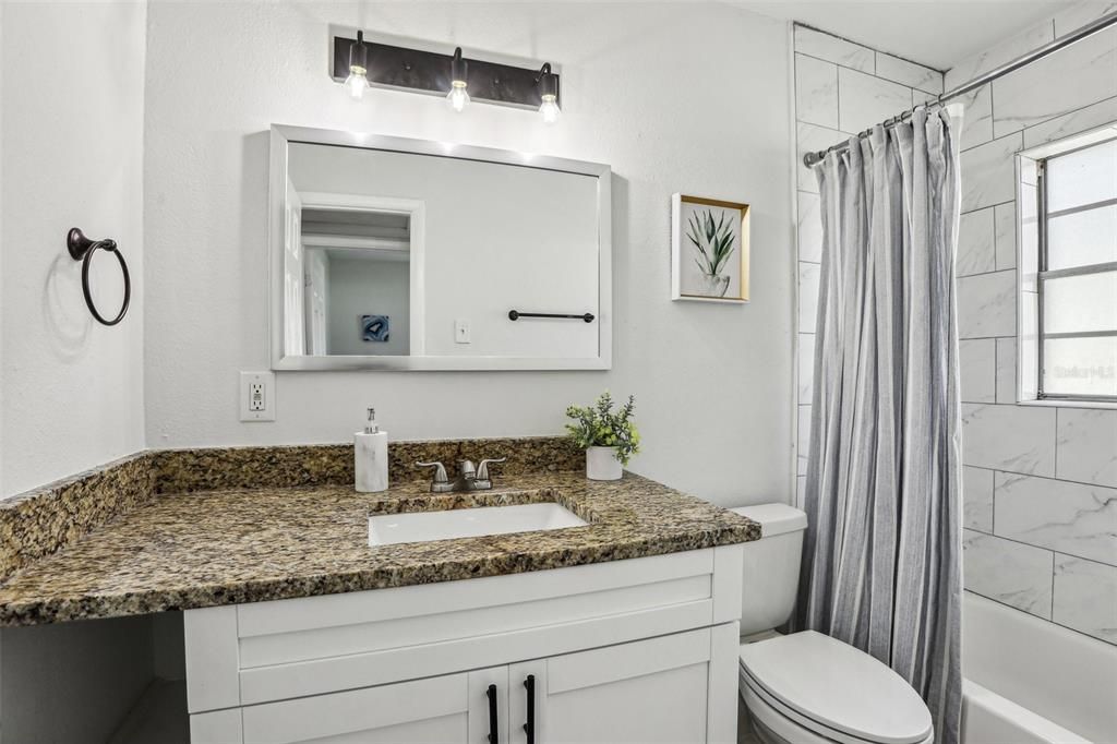 Fully Tiled Tub/Shower in 2nd Bath