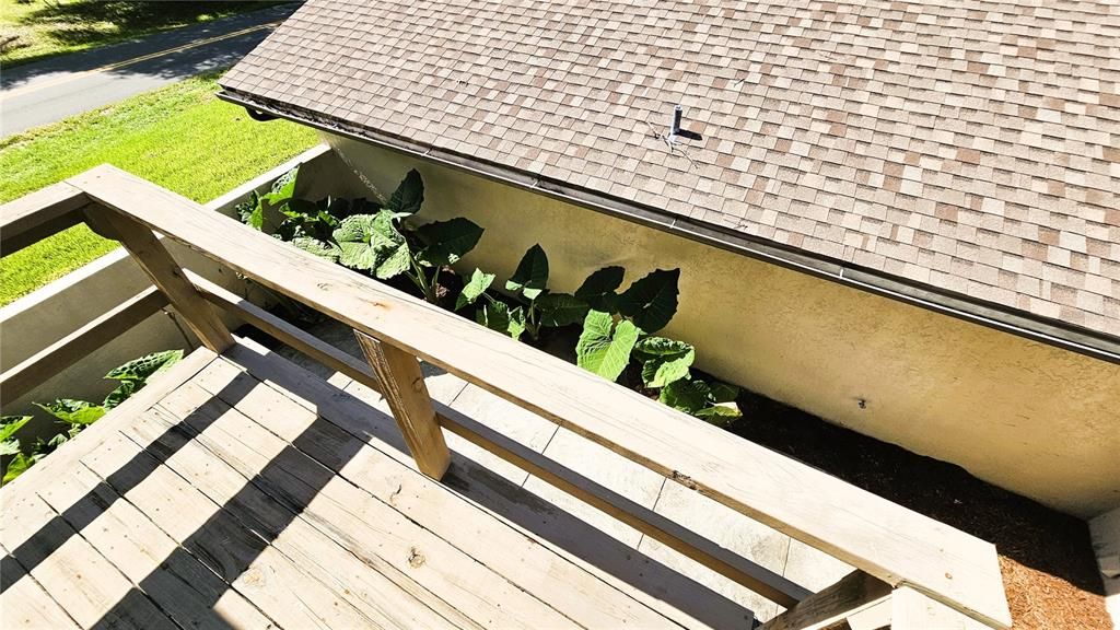 Balcony from Master bedroom upstairs. Overlooking downstairs patio.