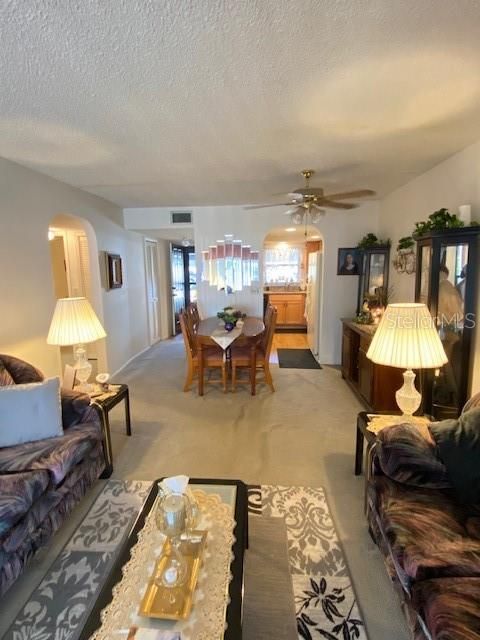 Looking towards dining and kitchen area