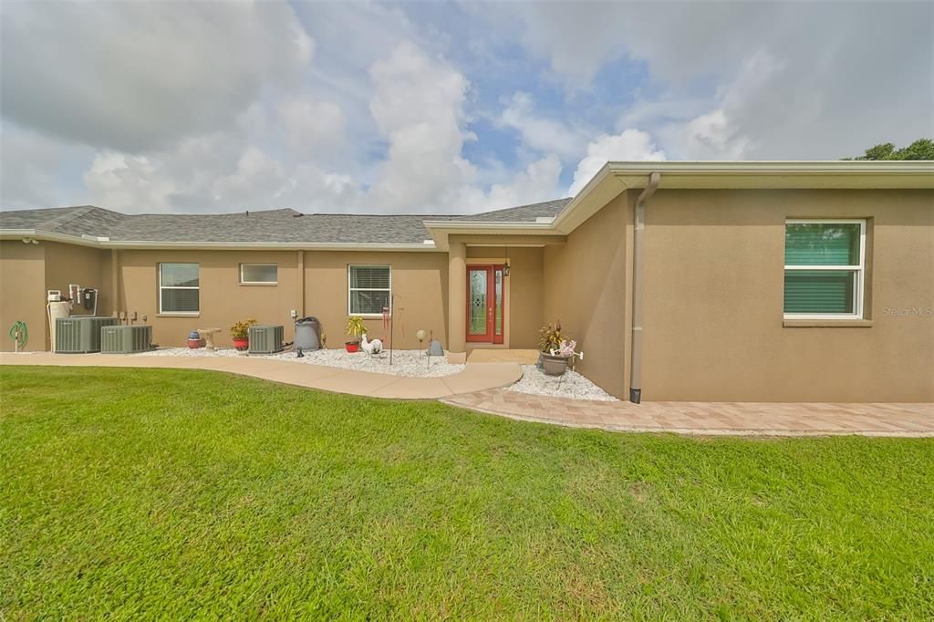 sidewalk down the right side of the home to the ADU exterior private entry.