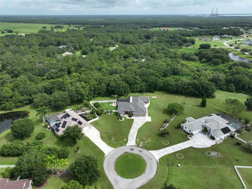 Aerial view- home in center