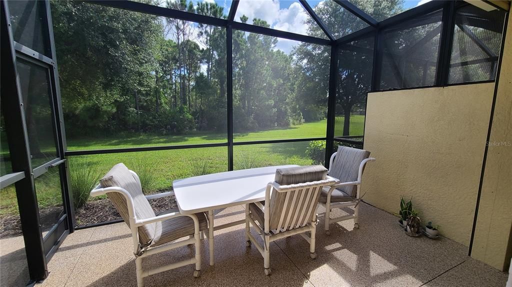 The spacious lanai has a push-button roll down hurricane protection.