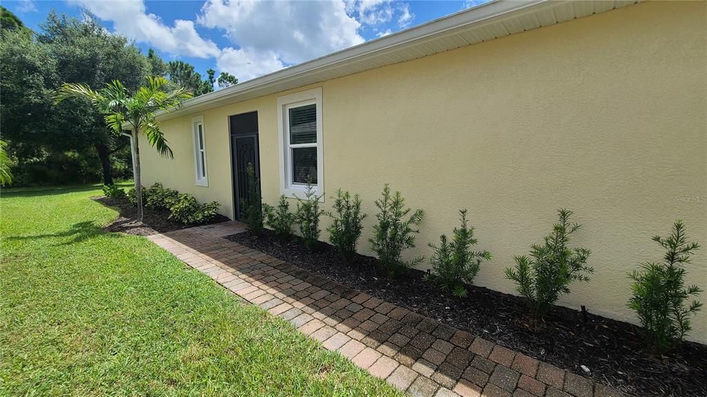 The main door is on the side of the home.