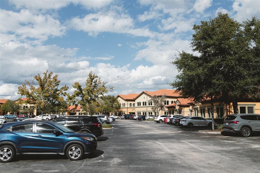 Large Parking Lot central to all the buildings in the plaza