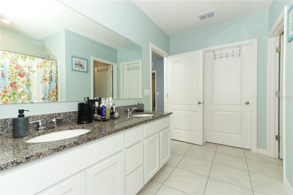 Huge en suite bathroom with dual vanities