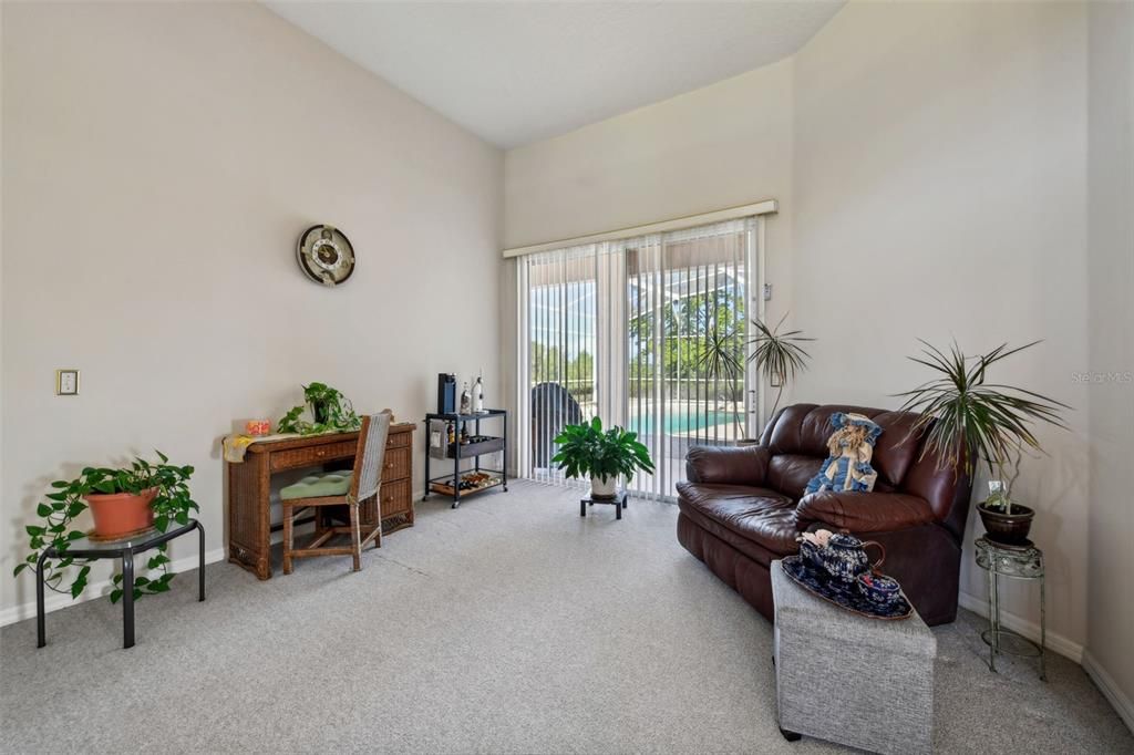 Formal Living Room with direct view of Pool and Acreage!