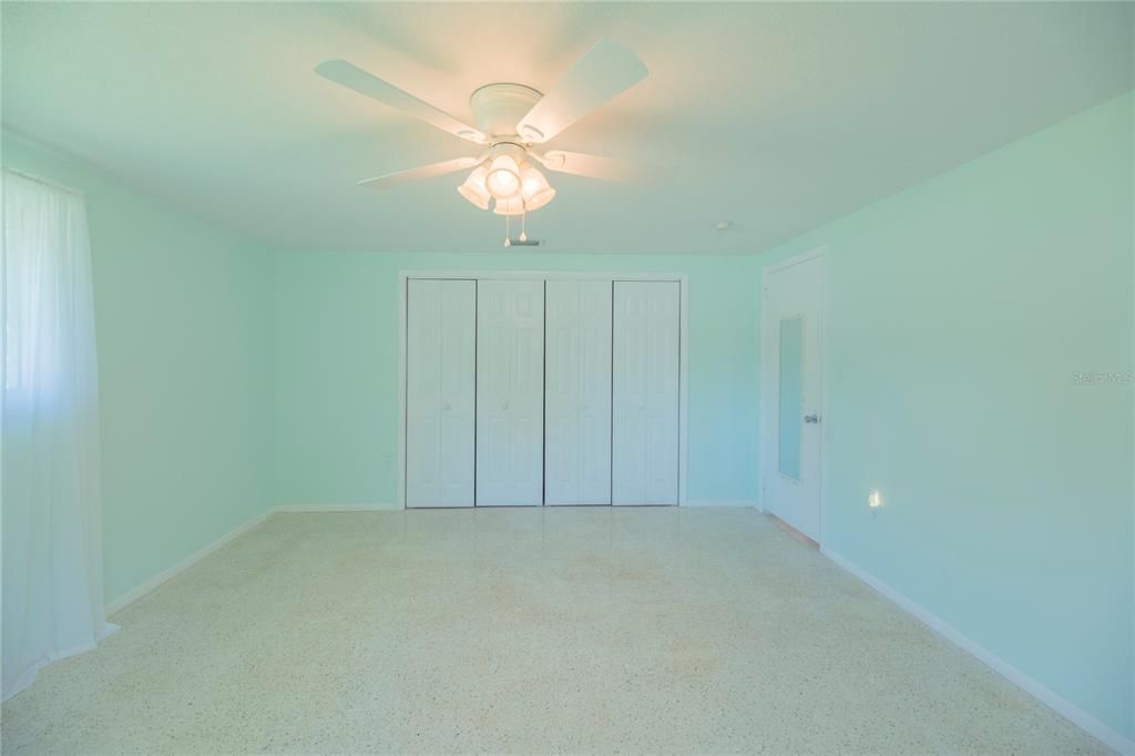 Primary bedroom view of closet