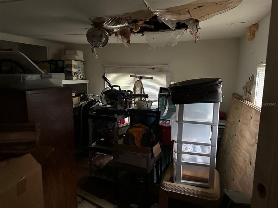 Secondary Bedroom - had a prior roof leak.  Leak has been repaired but needs new drywall.