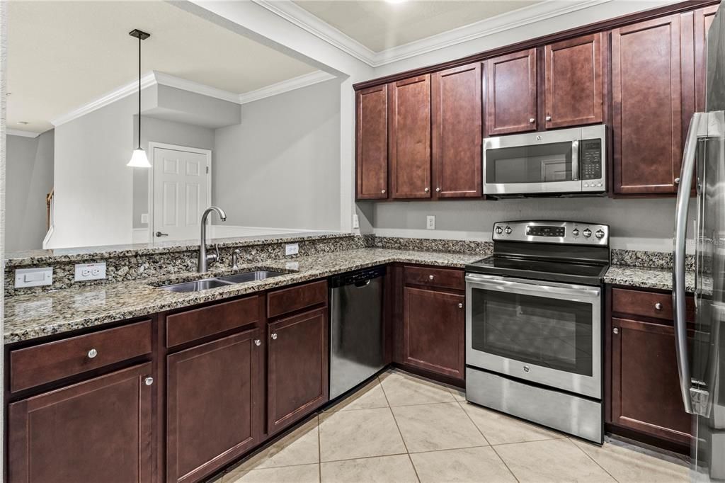 kitchen with stainless and granite counters