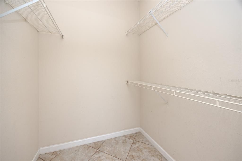 spacious primary walk in closet