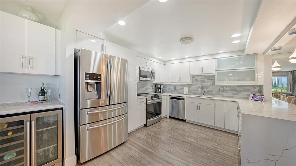 Wine captain and upgraded appliances make this kitchen great for entertaining.