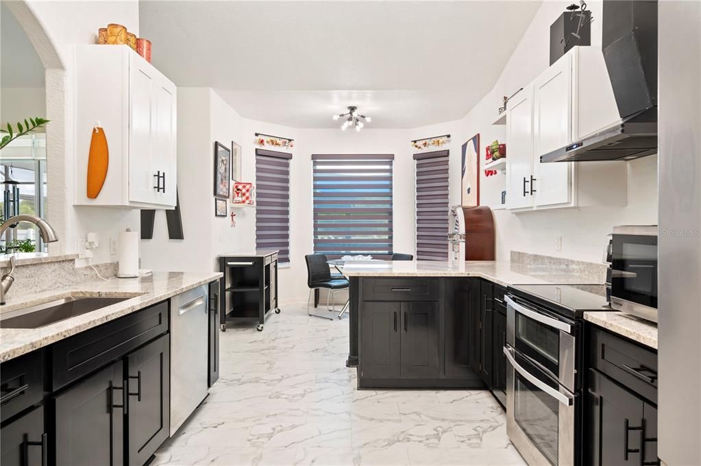 Kitchen and view of breakfast nook